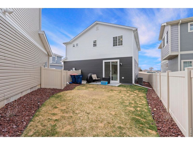 Exterior details and patio area of a home in Thompson River Ranch, Johnstown (Image 4).