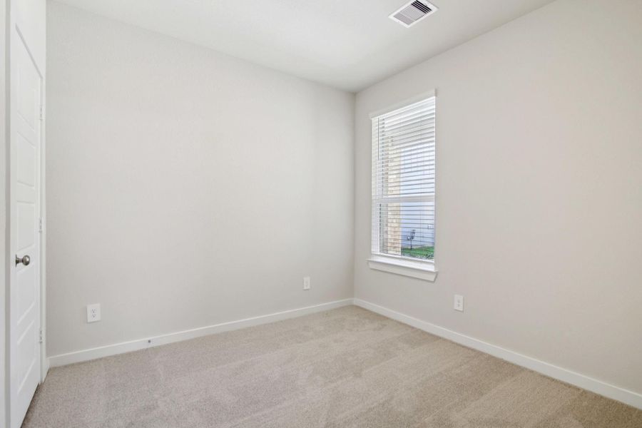 Spacious, unfurnished interior of a new home in Landing Meadows - Traditional Series, New Caney (Image 16).