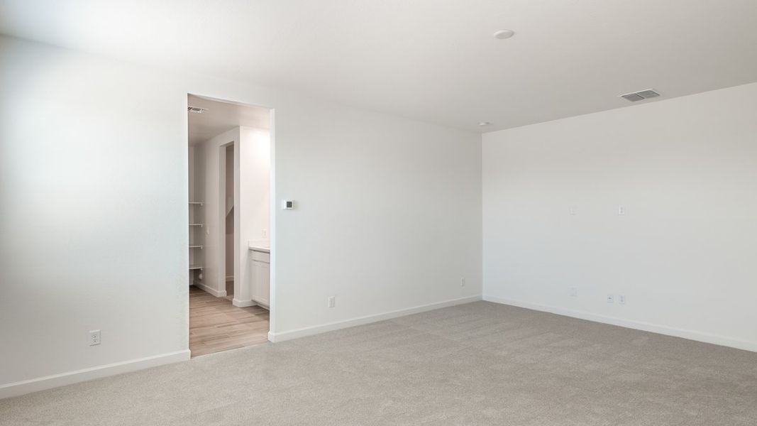 Spacious, unfurnished interior of a new home in Zanjero Pass, Waddell (Image 36).