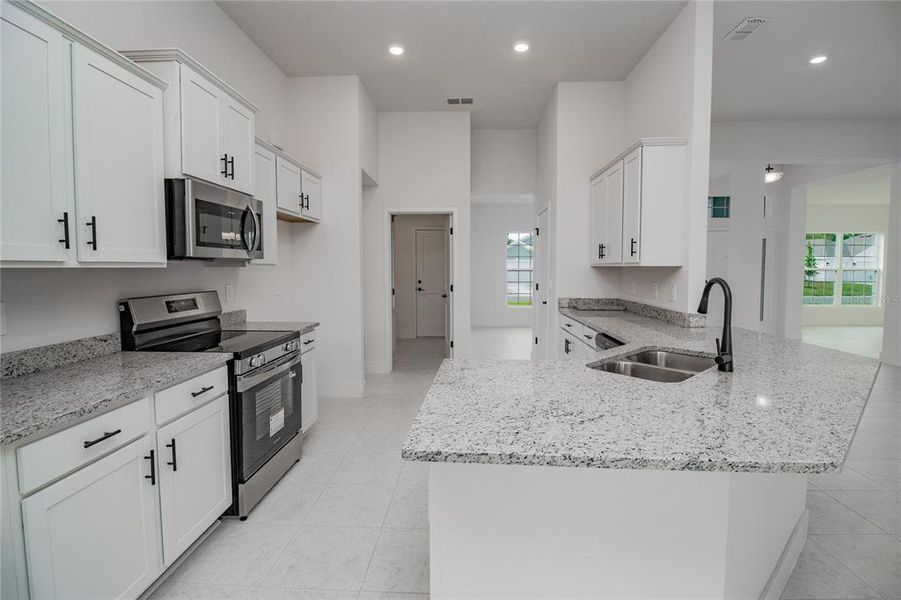 Furnished interior view inside a new home in Hickory Ridge Estates, Lake Wales (Image 10).