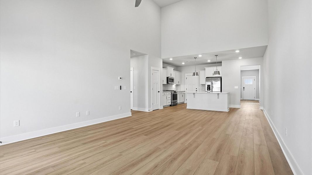 Memorable moments begin in this elegant, open family room with hardwood flooring and refined finishes in Anderson, SC Memorable moments begin in this elegant, open family room with hardwood flooring and refined finishes in Anderson, SC