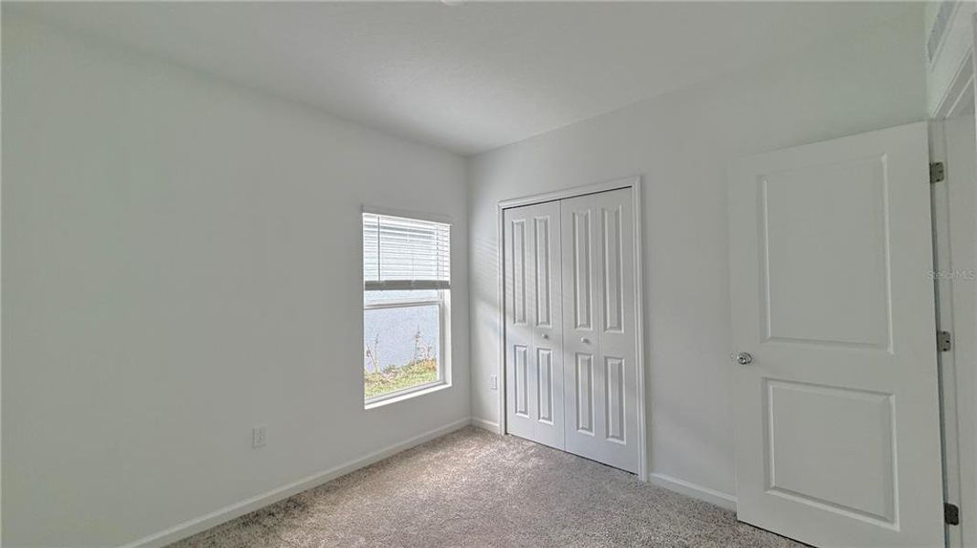 Spacious, unfurnished interior of a new home in Westview, Kissimmee (Image 22).