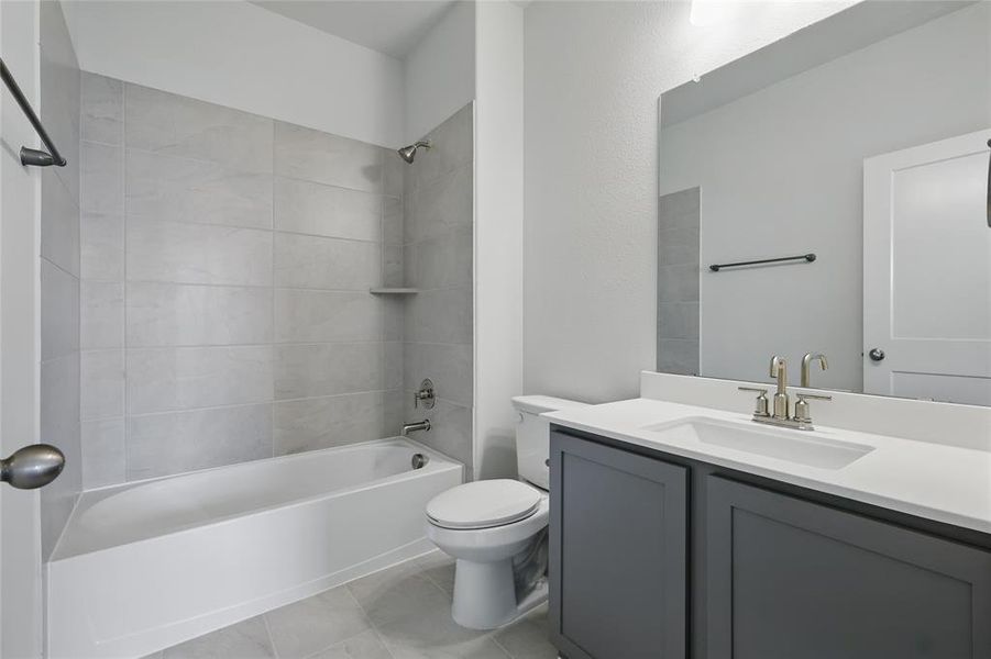 Full bathroom featuring vanity and shower / tub combination