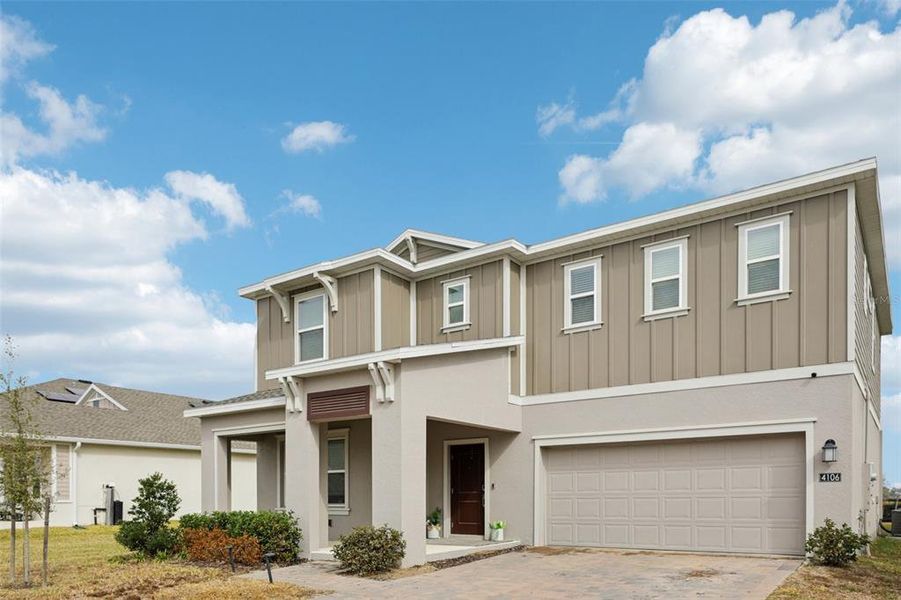 Front exterior of a new home in , Apopka, FL, highlighting curb appeal (Image 24).
