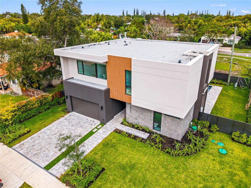 Front exterior of a new home in , Miami, FL, highlighting curb appeal (Image 2). Front exterior of a new home in , Miami, FL, highlighting curb appeal (Image 2).