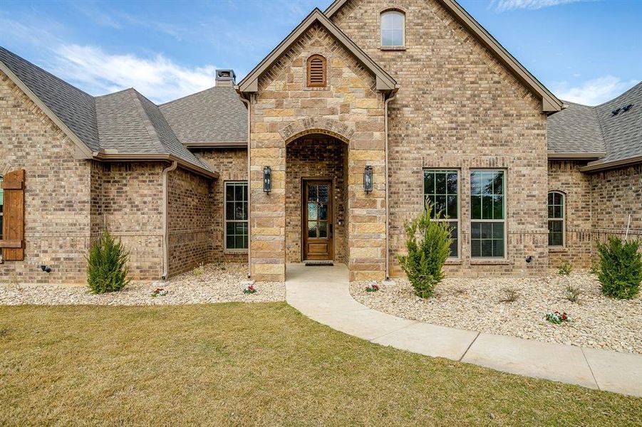 Exterior details and patio area of a home in Santana Ridge - Brock ISD, Weatherford (Image 4).