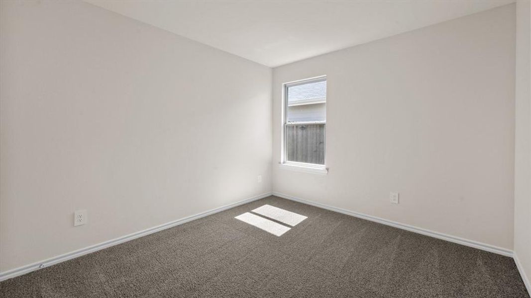Neutral tone walls with an accent window