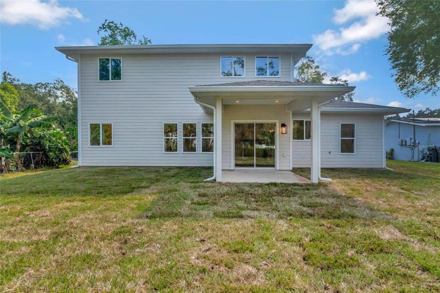 Front exterior of a new home in , High Springs, FL, highlighting curb appeal (Image 2). Front exterior of a new home in , High Springs, FL, highlighting curb appeal (Image 2).