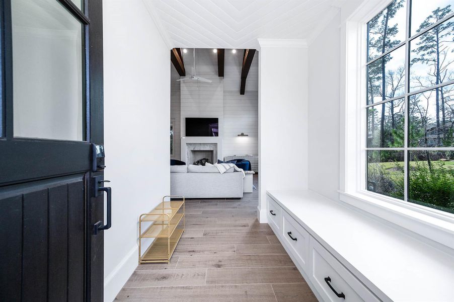 Custom Cabinets Upon entrance perfect for golf shoes, golf bags, and more.