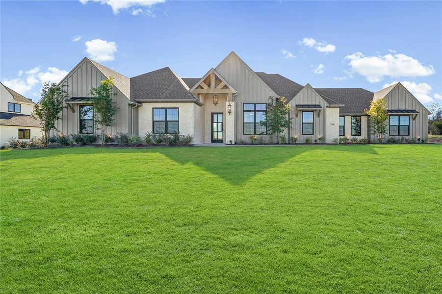 Front exterior of a new home in Putteet Hill, Cresson, TX, highlighting curb appeal (Image 2).