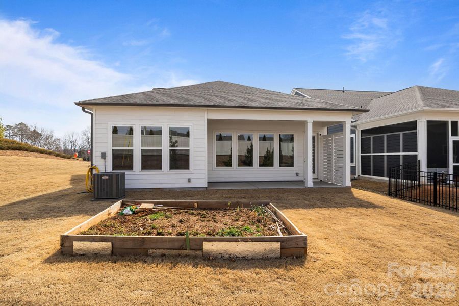 Exterior details and patio area of a home in Encore at Streamside - Classic Series, Waxhaw (Image 25).