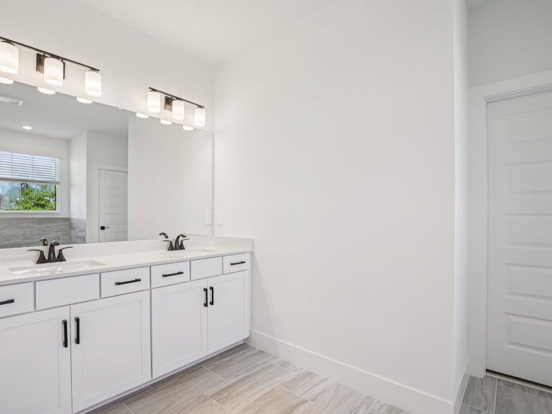 Furnished interior view inside a new home in Magnolia Bay - Reserve Series, Nokomis (Image 6).