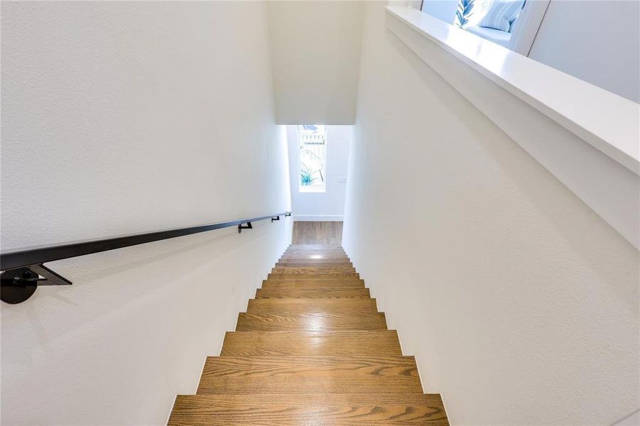 Staircase with wood-type flooring