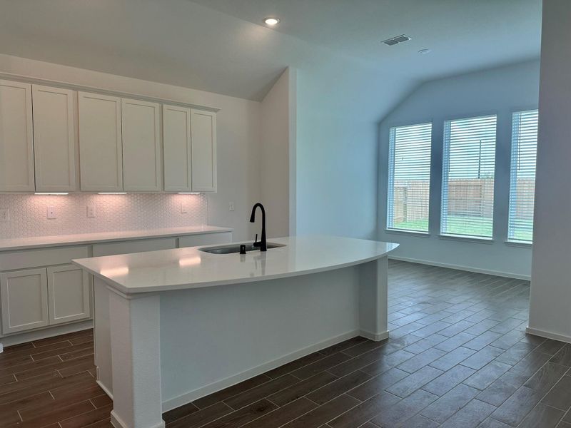 Furnished interior view inside a new home in Creekhaven, Iowa Colony (Image 8).