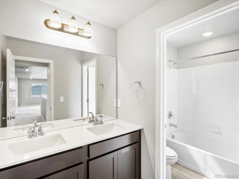 Furnished interior view inside a new home in Buffalo Highlands: The Canyon Collection, Commerce City (Image 11).