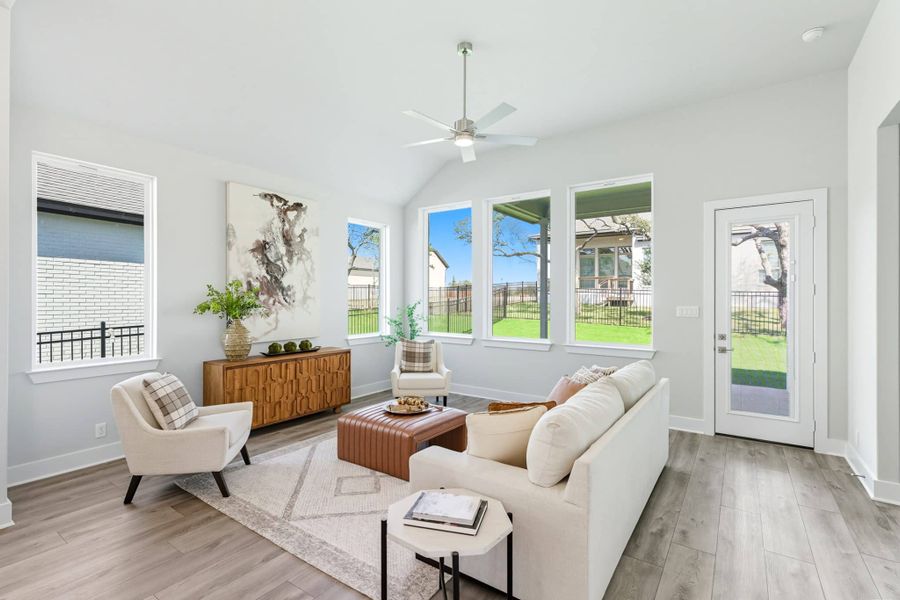 Representative furnished interior of a home built from the Hampton by Chesmar Homes in Buffalo Crossing, Cibolo (Image 7).