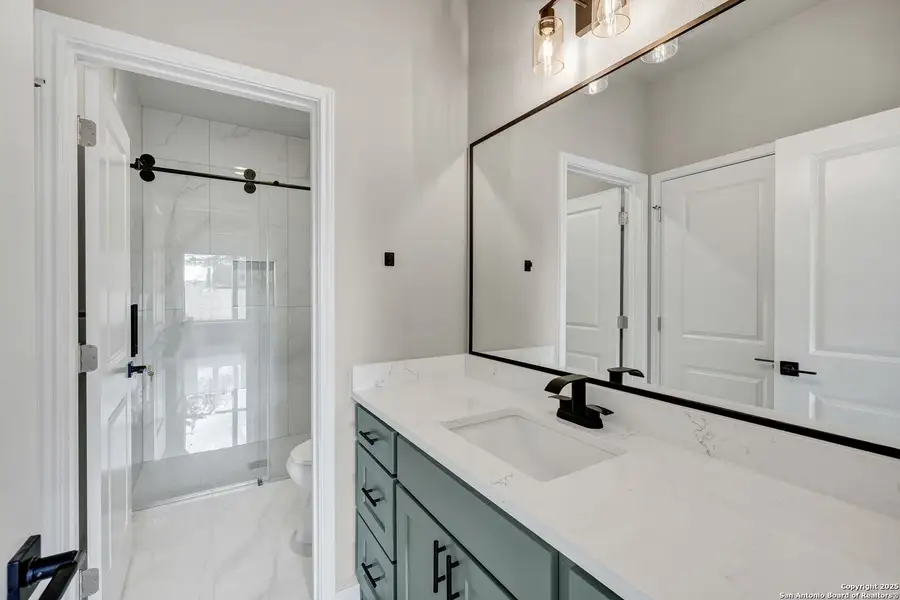 Furnished interior view inside a new home in , Elmendorf (Image 9).