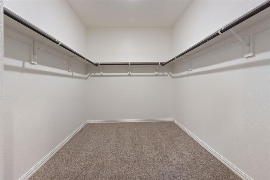 Massive walk in closet in primary bedroom