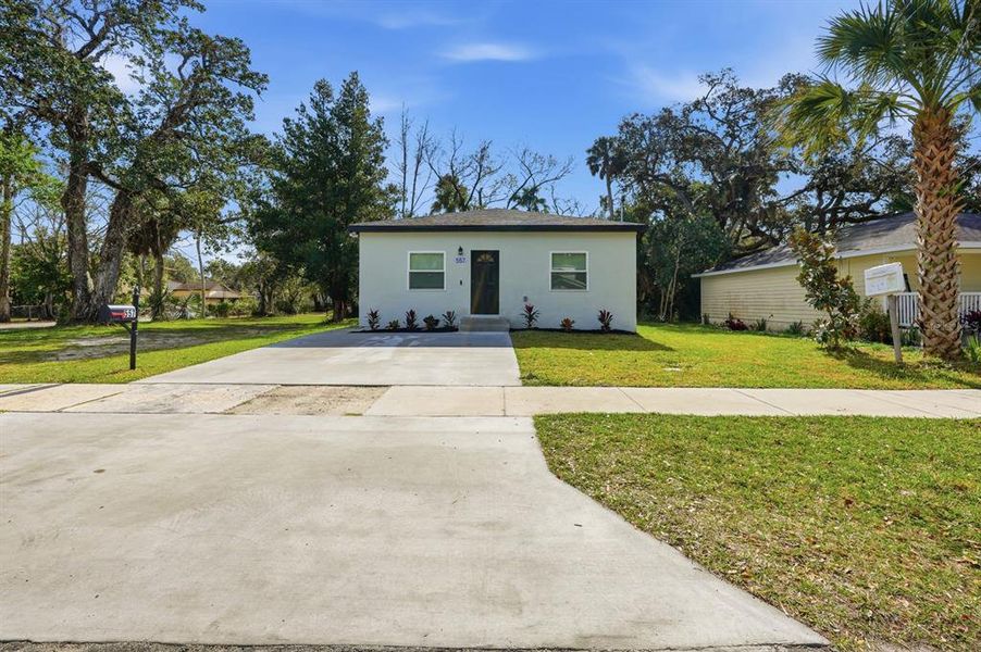Front exterior of a new home in , Daytona Beach, FL, highlighting curb appeal (Image 1). Front exterior of a new home in , Daytona Beach, FL, highlighting curb appeal (Image 1).