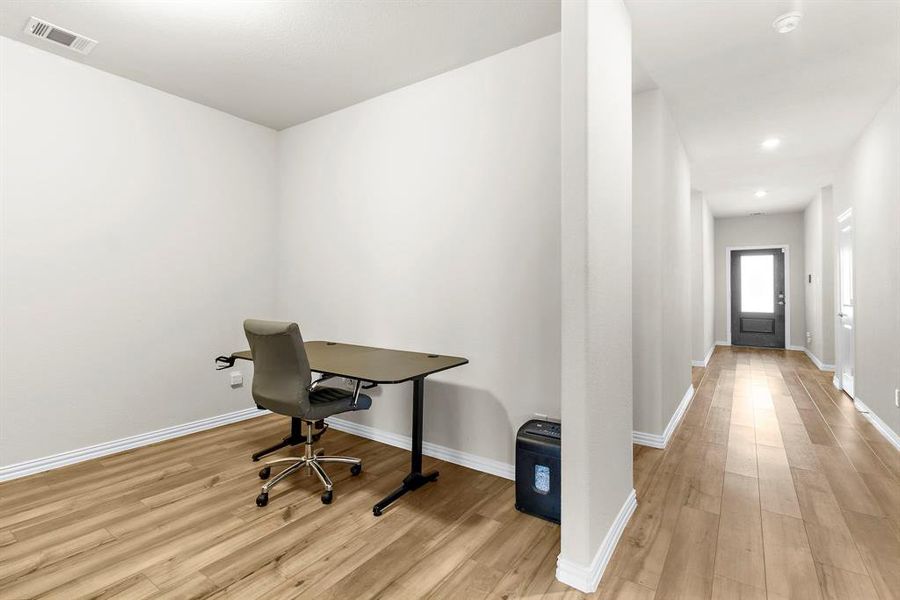 Office featuring light wood-type flooring and recessed lighting Office featuring light wood-type flooring and recessed lighting