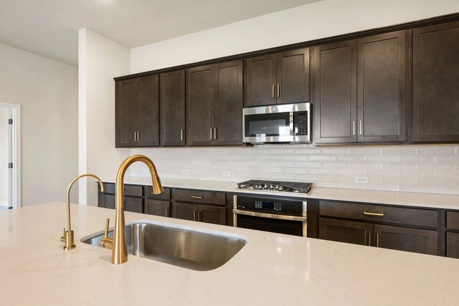 Furnished interior view inside a new home in The Colony 50s, Bastrop (Image 10).