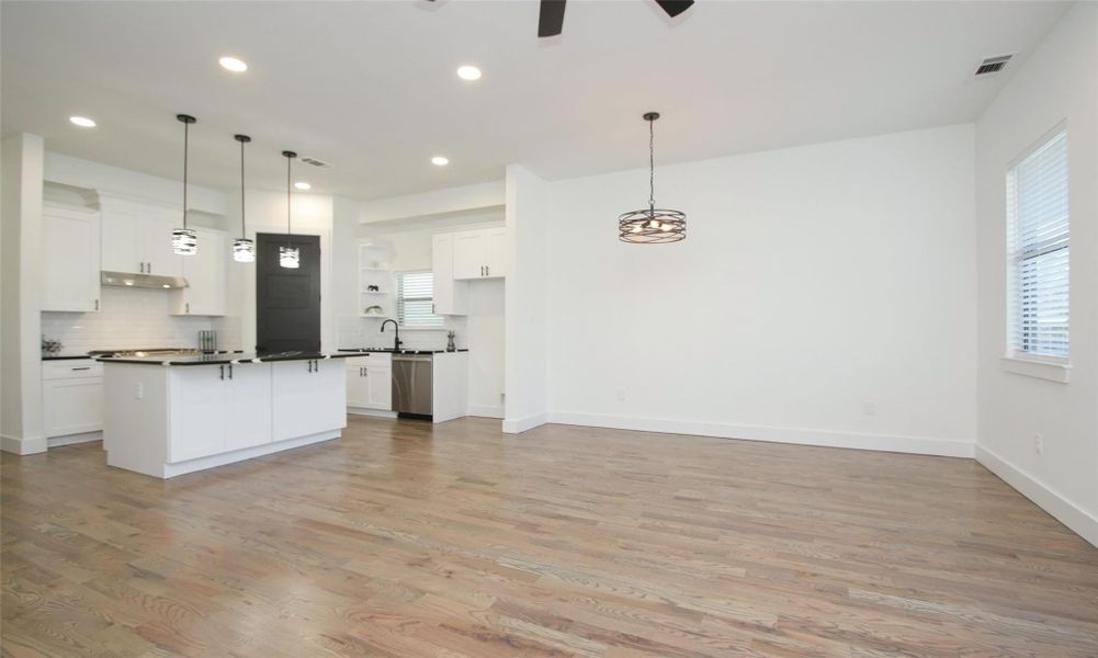 This open concept home offers a dedicated dining space combined with the living room and kitchen perfect for entertaining. This open concept home offers a dedicated dining space combined with the living room and kitchen perfect for entertaining.