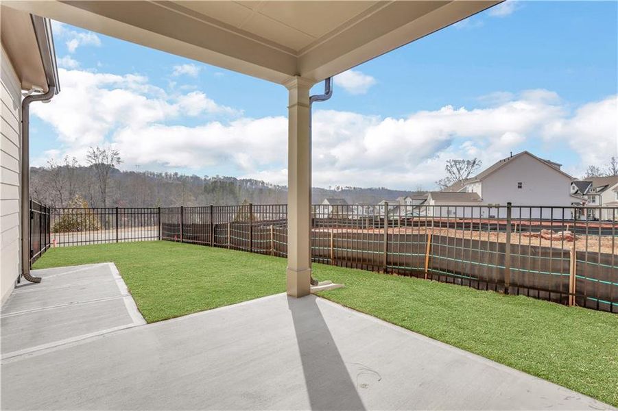 Exterior details and patio area of a home in Marble Tree, Ball Ground (Image 3).