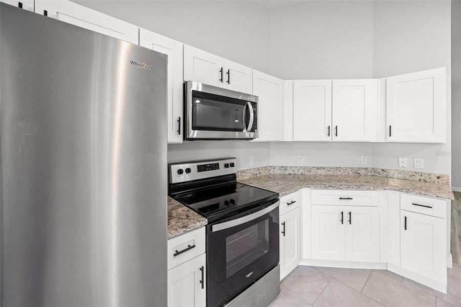 Furnished interior view inside a new home in , Bushnell (Image 6).