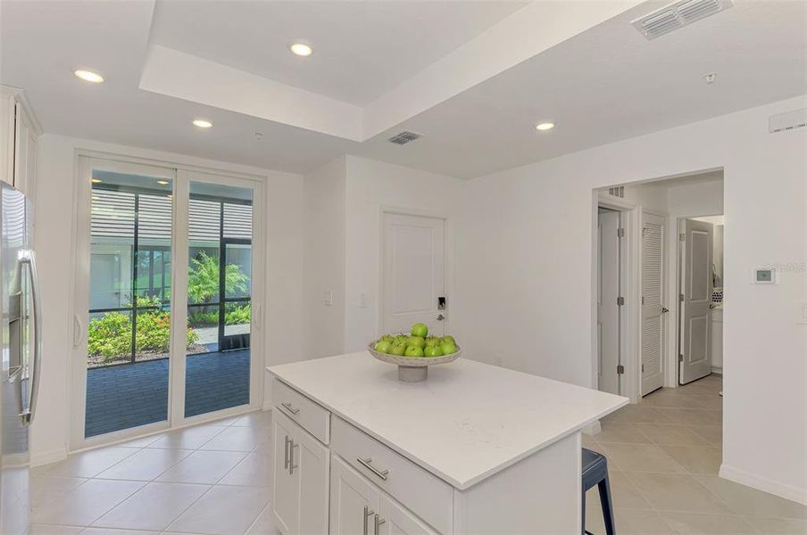 Furnished interior view inside a new home in Wellen Park Golf & Country Club, Venice (Image 19).