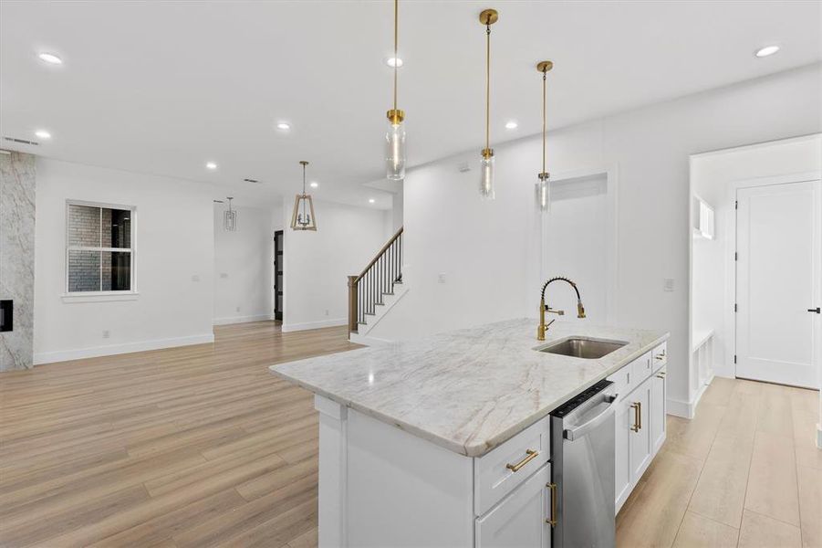 View from the spacious kitchen through to the front entrance.