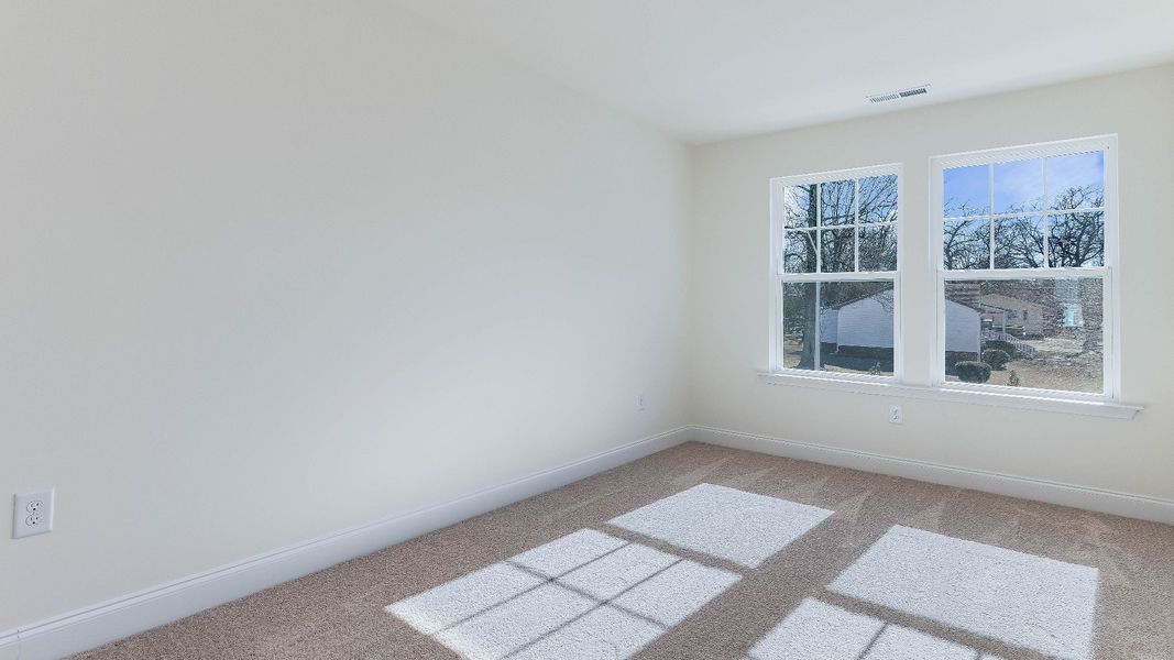 Furnished interior view inside a new home in Battle Bridge, Raleigh (Image 32).