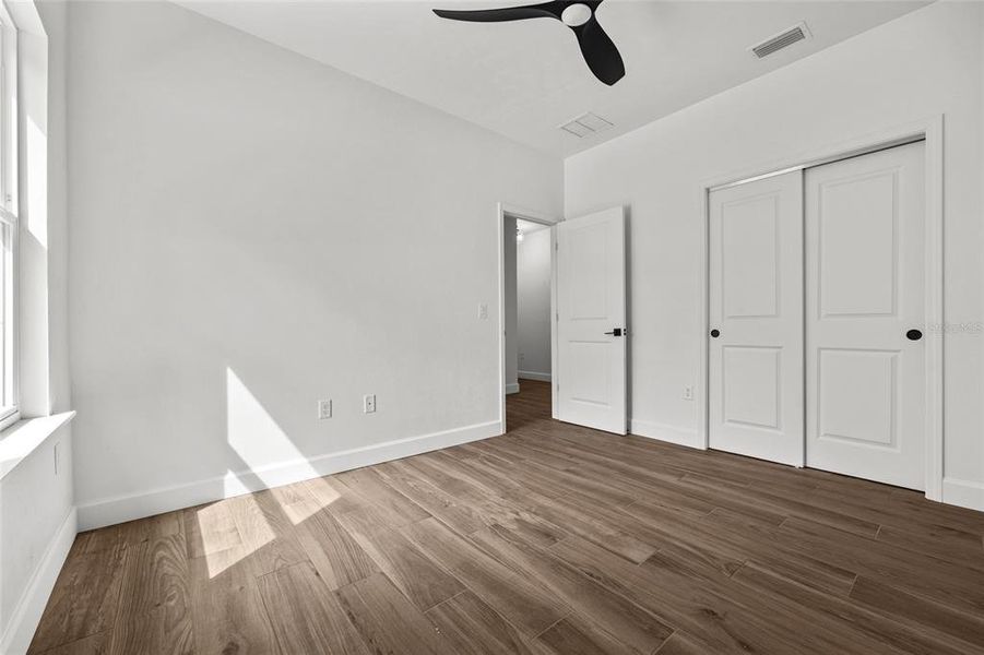 Spacious, unfurnished interior of a new home in Grand Oaks, Gainesville (Image 24).