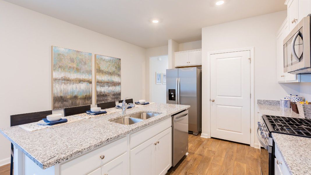 Representative furnished interior of a home built from the GLENWOOD by D.R. Horton in Huggins Hill, Manning (Image 6). Representative furnished interior of a home built from the GLENWOOD by D.R. Horton in Huggins Hill, Manning (Image 6).