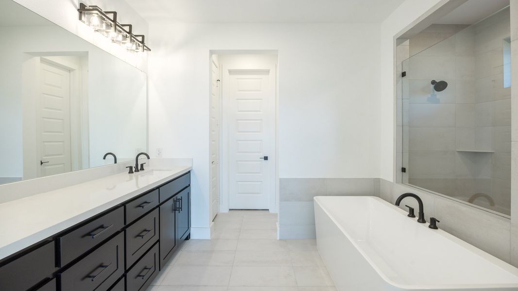 Furnished interior view inside a new home in Parkside On The River 60', Georgetown (Image 8).