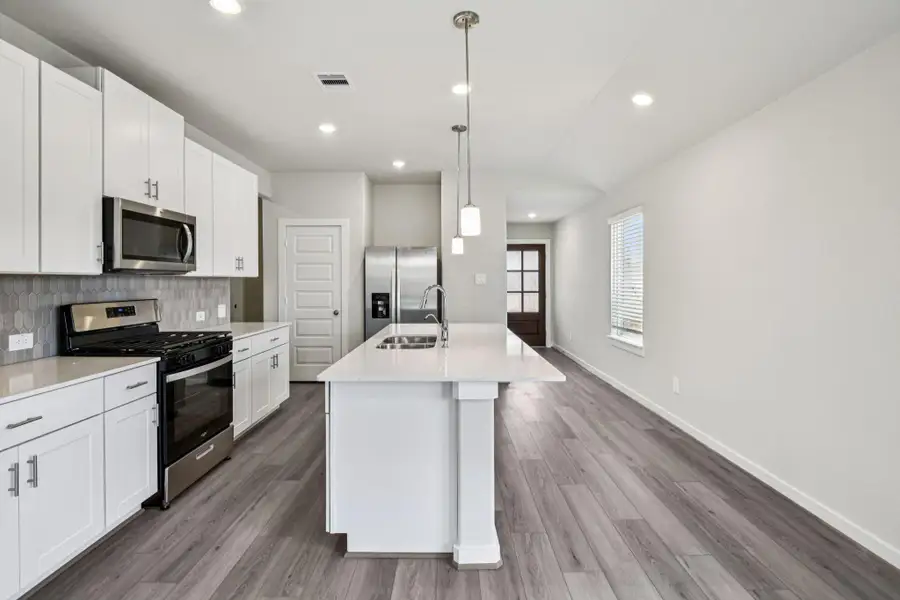 Photo is not of the actual home, but is an inspirational photo of builder’s model home and may depict options, furnishings, and/or decorator features that are not included