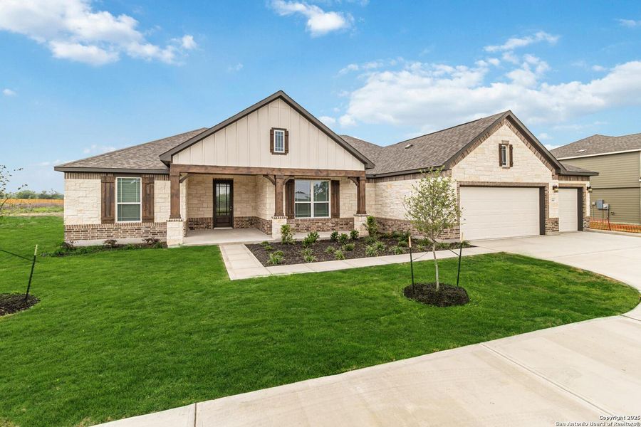 Front exterior of a new home in Lonesome Dove, San Antonio, TX, highlighting curb appeal (Image 1). Front exterior of a new home in Lonesome Dove, San Antonio, TX, highlighting curb appeal (Image 1).