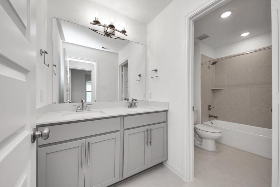 Furnished interior view inside a new home in Elyson, Katy (Image 18).