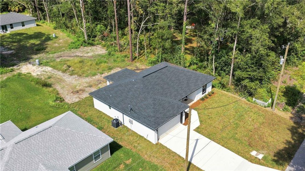Front exterior of a new home in , Dunnellon, FL, highlighting curb appeal (Image 20).