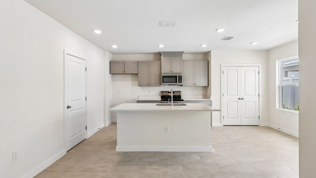 Furnished interior view inside a new home in Cyrene at Harmony, St. Cloud (Image 10).