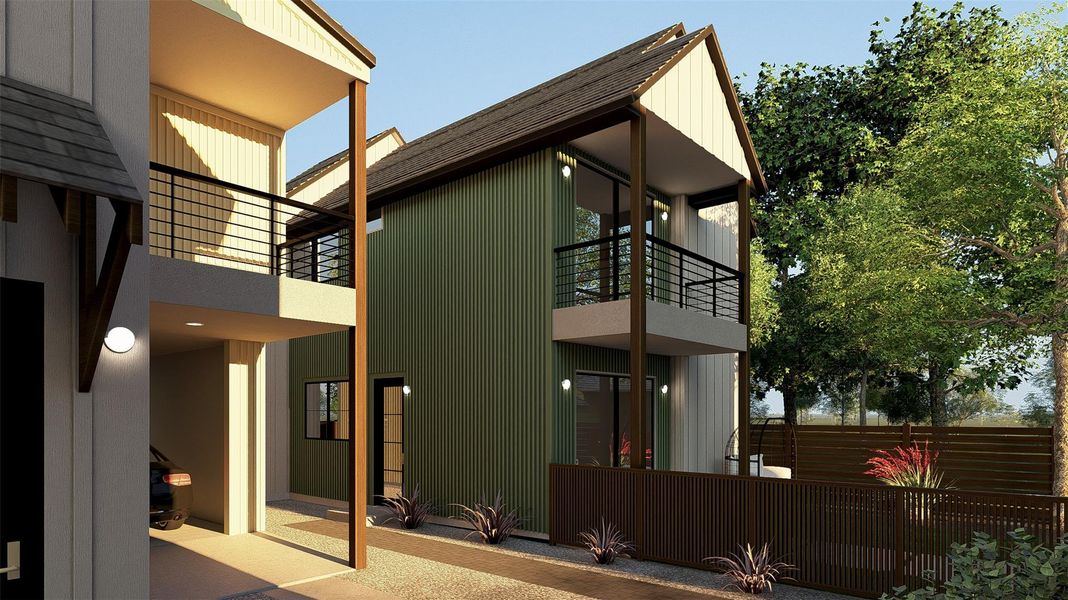 View of side of home with a balcony and a shingled roof View of side of home with a balcony and a shingled roof