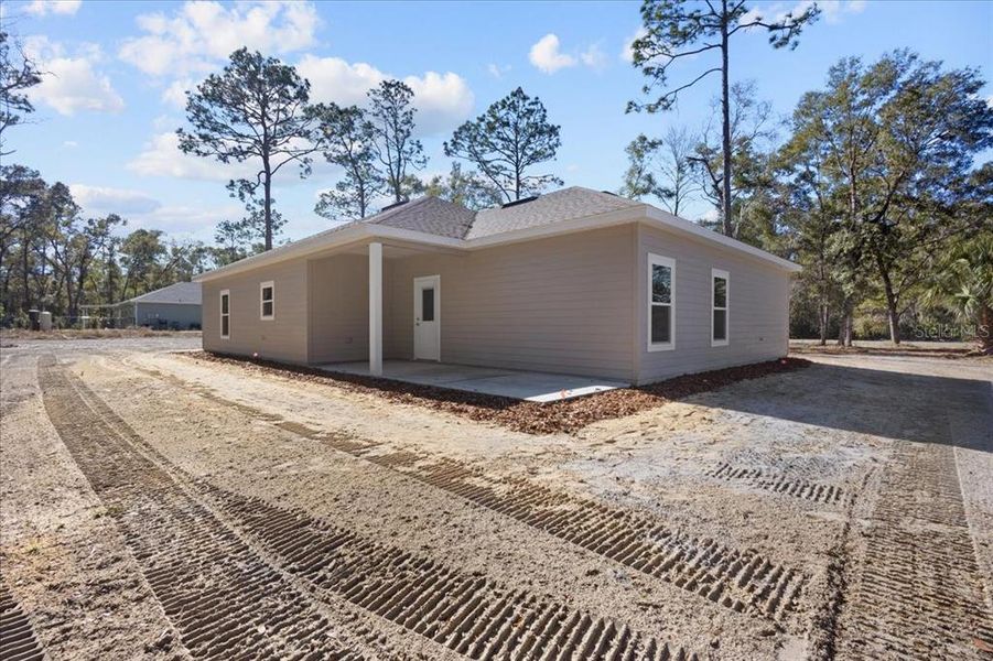 Exterior details and patio area of a home in , Chiefland (Image 34).