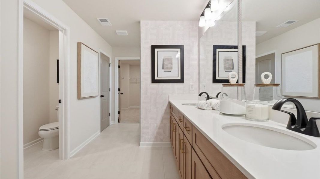 Representative furnished interior of a home built from the Stonefield - Side Entry by DRB Homes in Brighton, Locust Grove (Image 29).