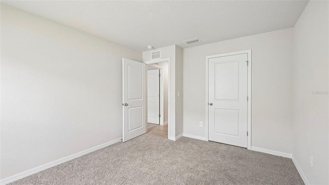 Spacious, unfurnished interior of a new home in Rye Crossing, Parrish (Image 37).
