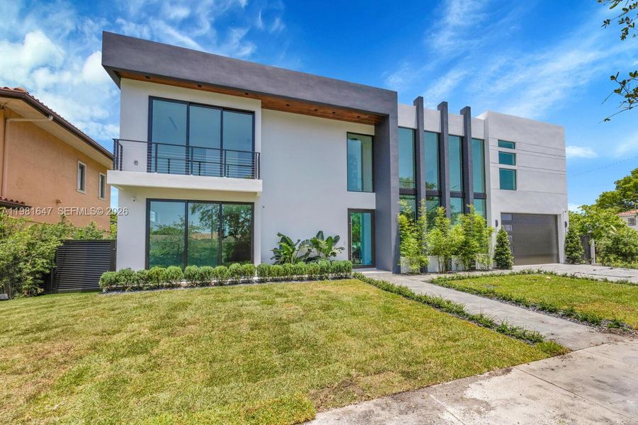 Front exterior of a new home in , Miami, FL, highlighting curb appeal (Image 28).