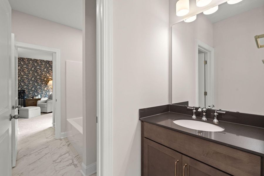Furnished interior view inside a new home in Tidewater at Lakes of Cane Bay, Summerville (Image 49).