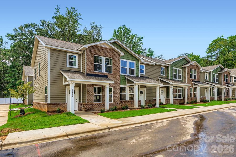 Front exterior of a new home in , Charlotte, NC, highlighting curb appeal (Image 25).