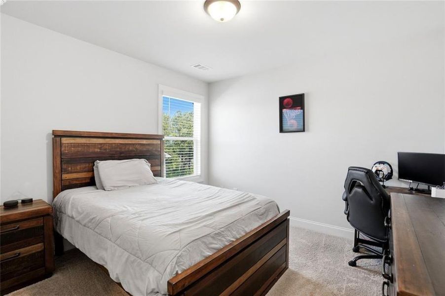 Furnished interior view inside a new home in Calgary Downs, Winder (Image 20).