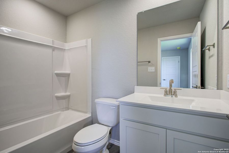 Furnished interior view inside a new home in Hickory Ridge, San Antonio (Image 64).