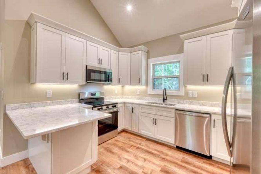 Furnished interior view inside a new home in , Blairsville (Image 6).