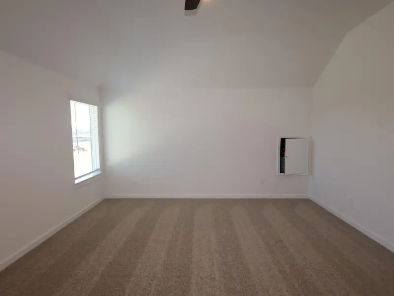 Spacious, unfurnished interior of a new home in Pinewood at Grand Texas, New Caney (Image 13).